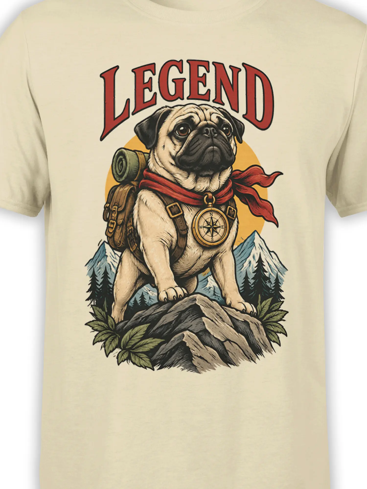 Close-up of the pug explorer graphic with compass, red scarf, mountain peaks, and LEGEND text on beige fabric