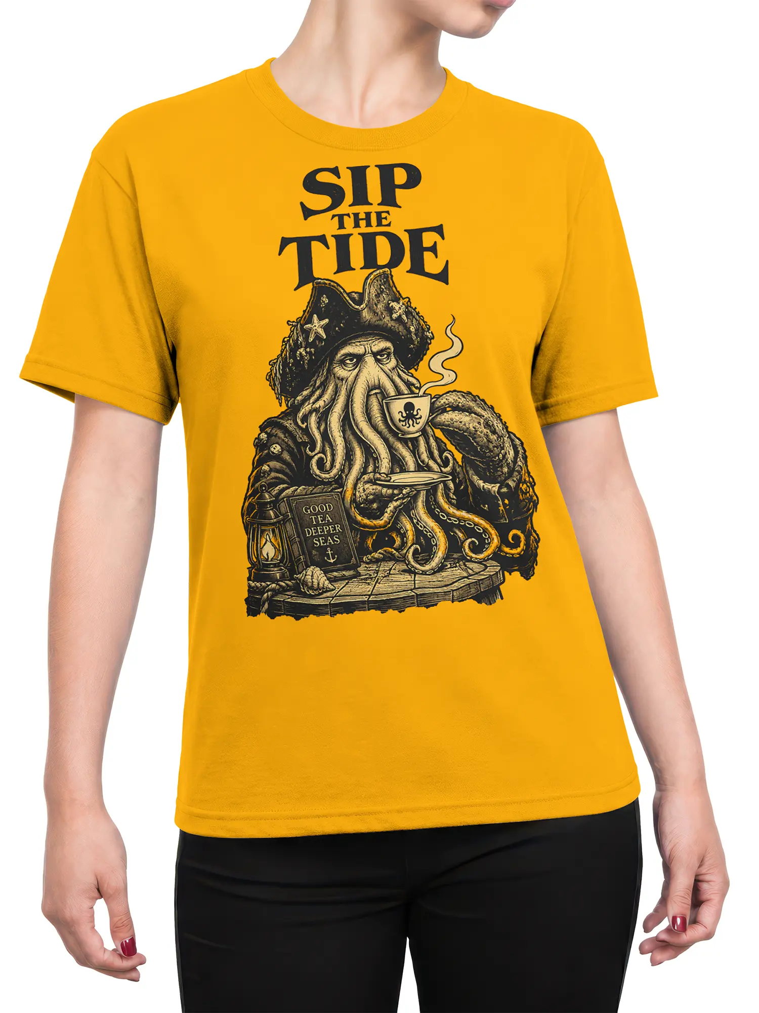Female torso wearing a yellow octopus graphic tee with tea, nautical details, and vintage “SIP THE TIDE” artwork