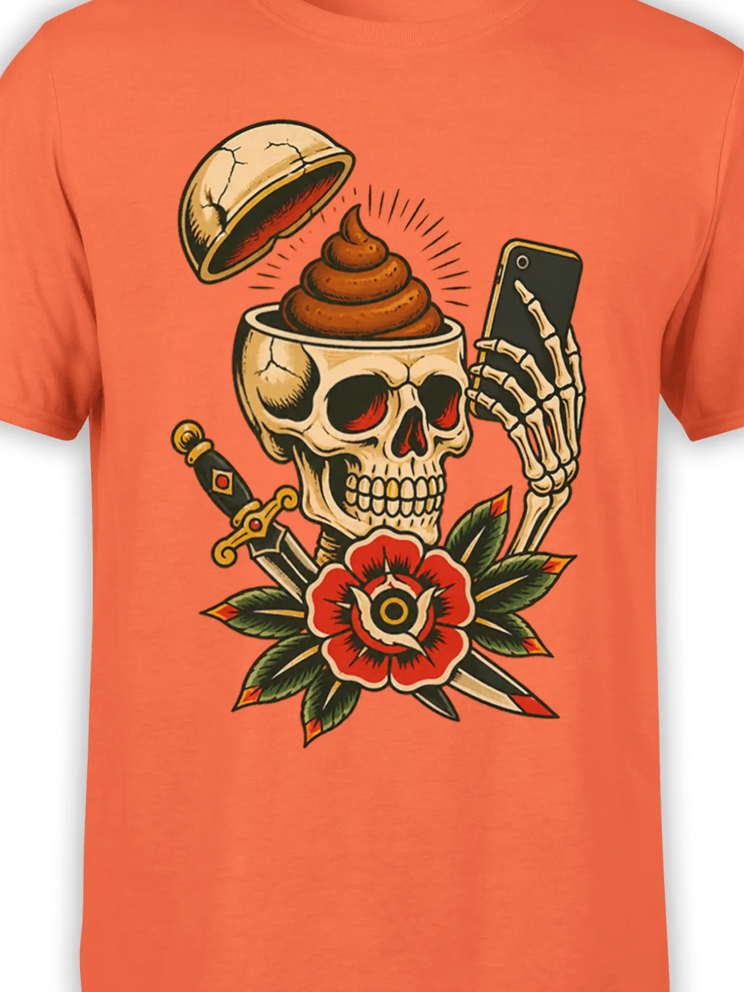 Close-up of skeleton skull artwork with smartphone, cracked cup, red flower, and crossed blades on an orange T-shirt