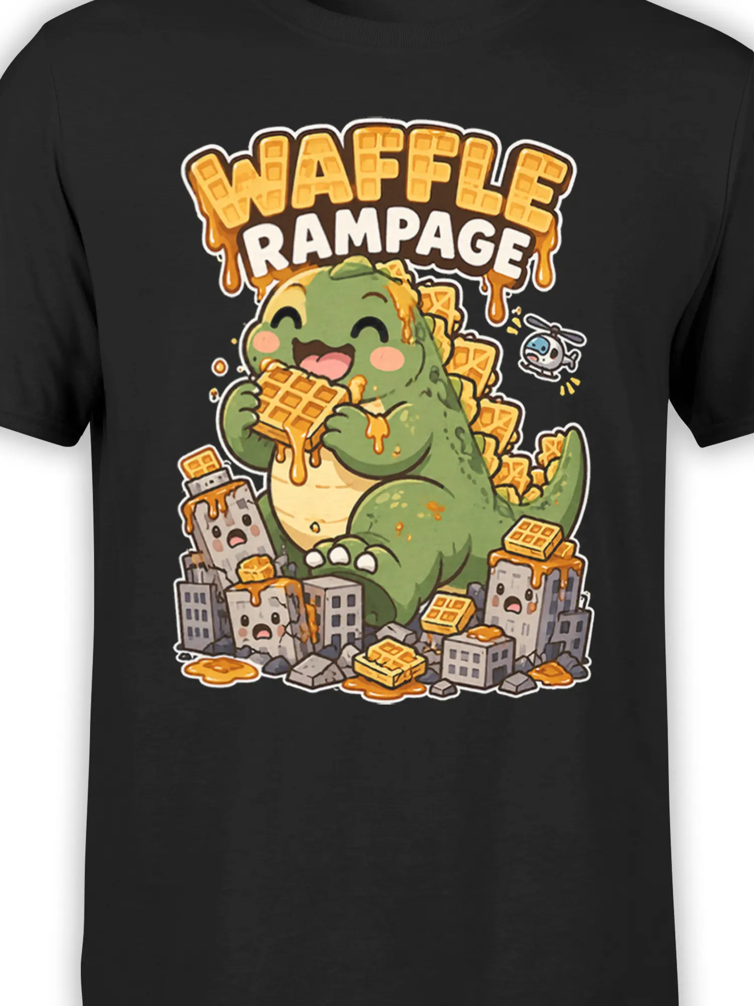 Close-up of green dinosaur, golden waffles, syrup, city buildings, helicopter, and Waffle Rampage artwork on black fabric