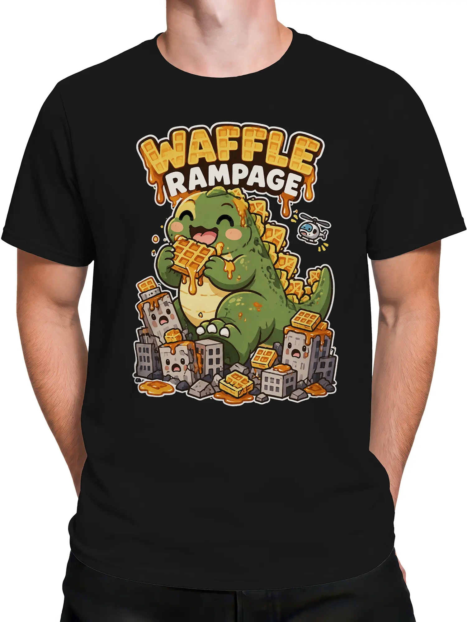 Male torso wearing a black dinosaur graphic T-shirt with waffles, syrupy buildings, helicopter, and bold lettering
