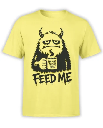 Yellow T-shirt with a shaggy horned monster holding coffee and bold “Feed Me” text