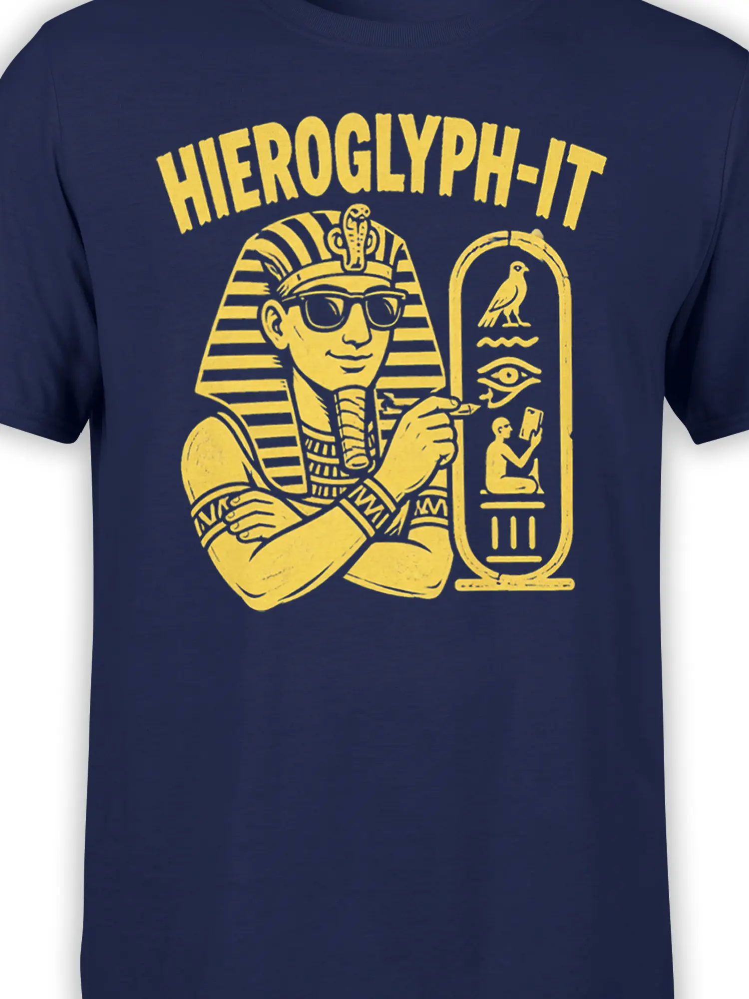 Close-up of the golden pharaoh and ancient symbols printed on a navy Egyptian graphic tee