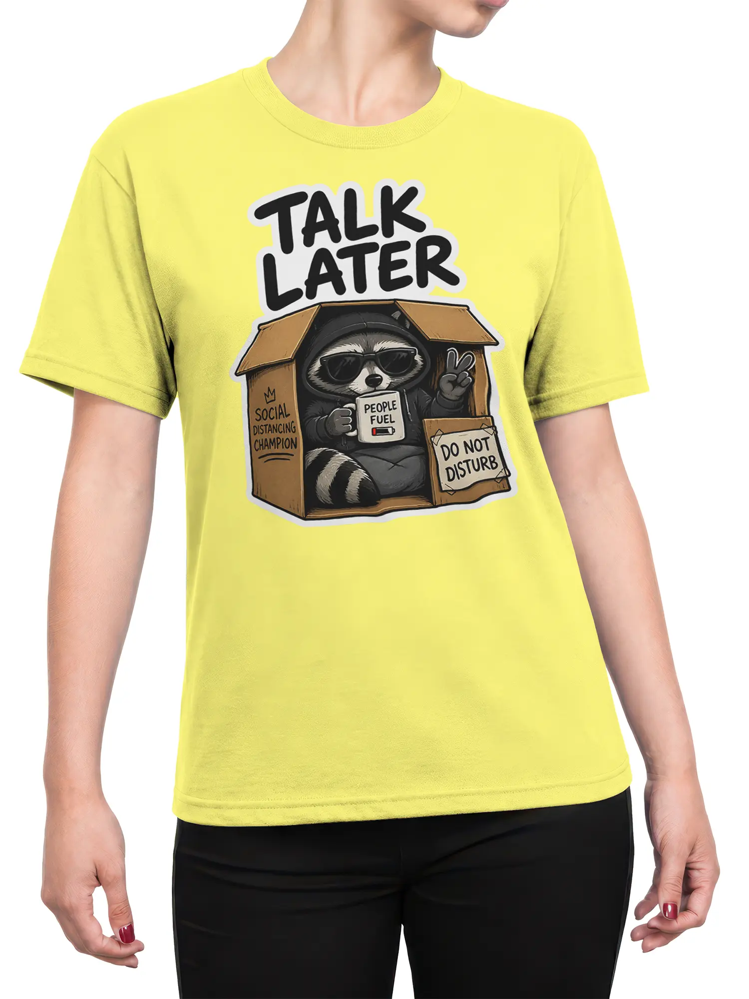 Female torso wearing a yellow raccoon T-shirt with sunglasses, coffee, and “Talk Later” artwork