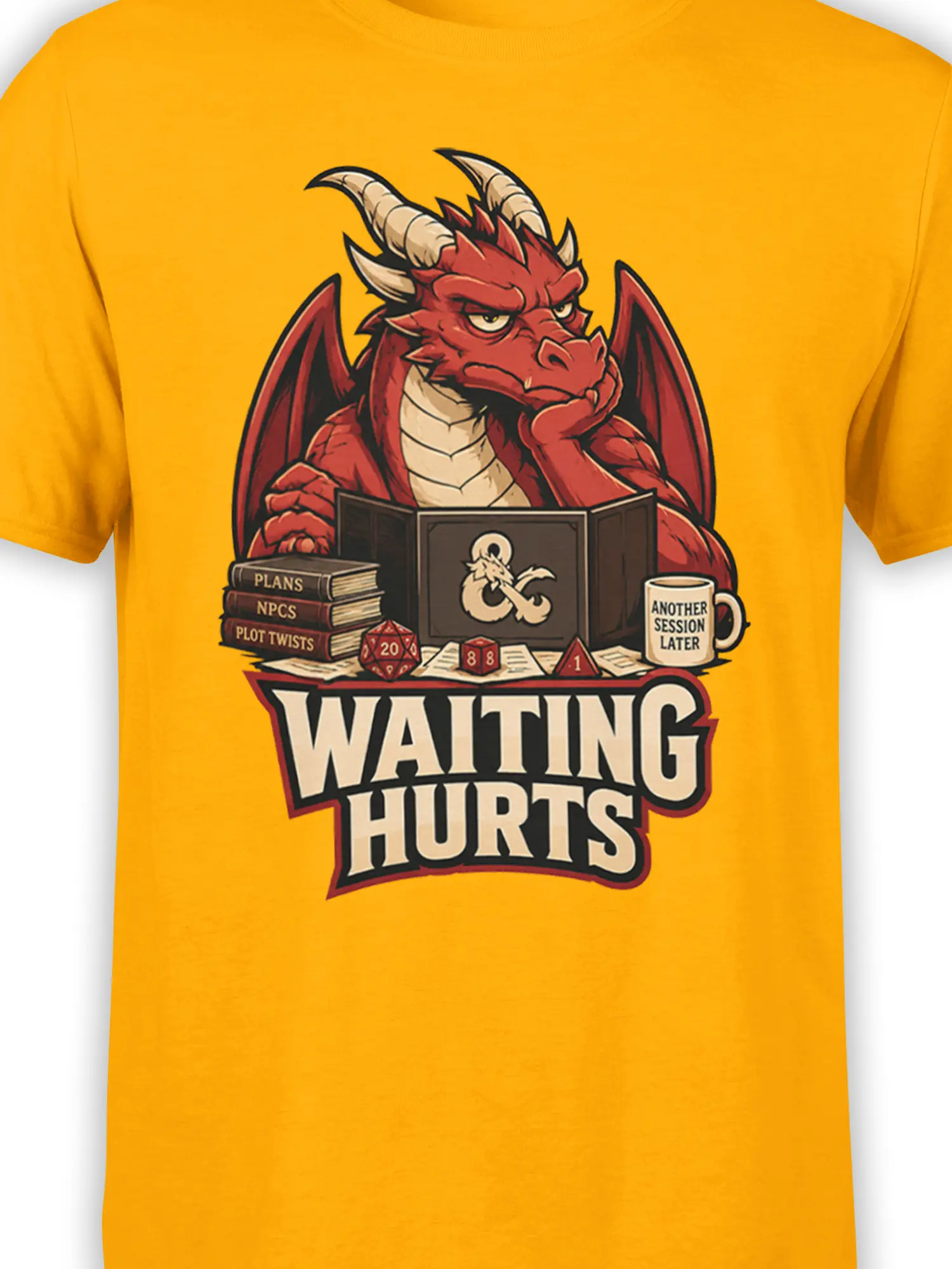 Close-up of red dragon tabletop RPG artwork with dice, books, mug, and Waiting Hurts text on an orange shirt