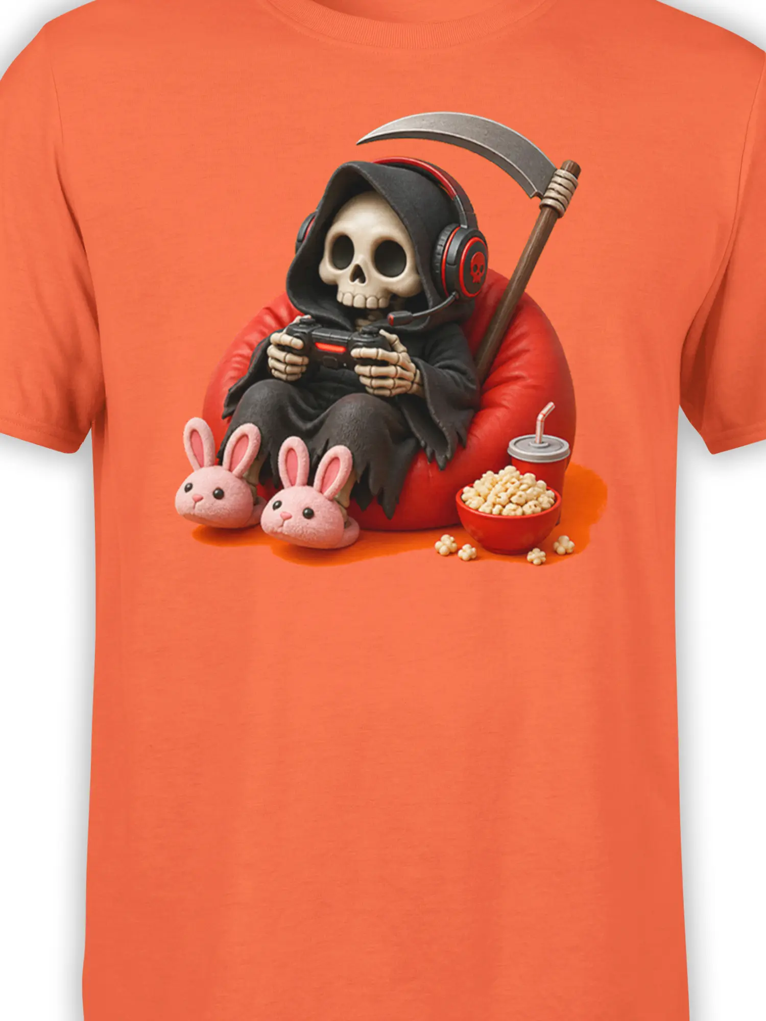 Close-up of the skull gamer graphic with headset, controller, scythe, bunny slippers, popcorn, and soda