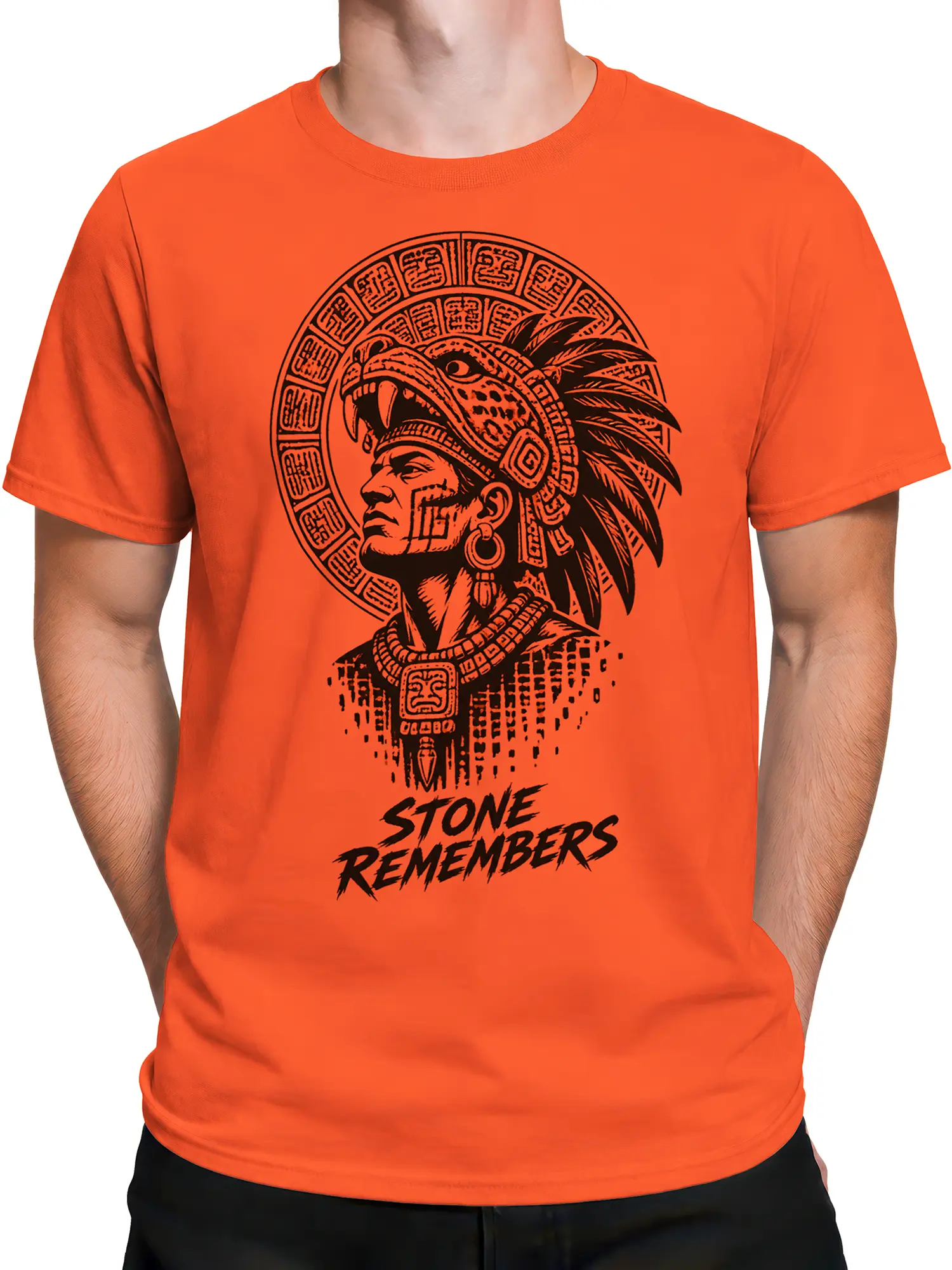 Male torso wearing an orange T-shirt with black indigenous warrior graphic and lettering