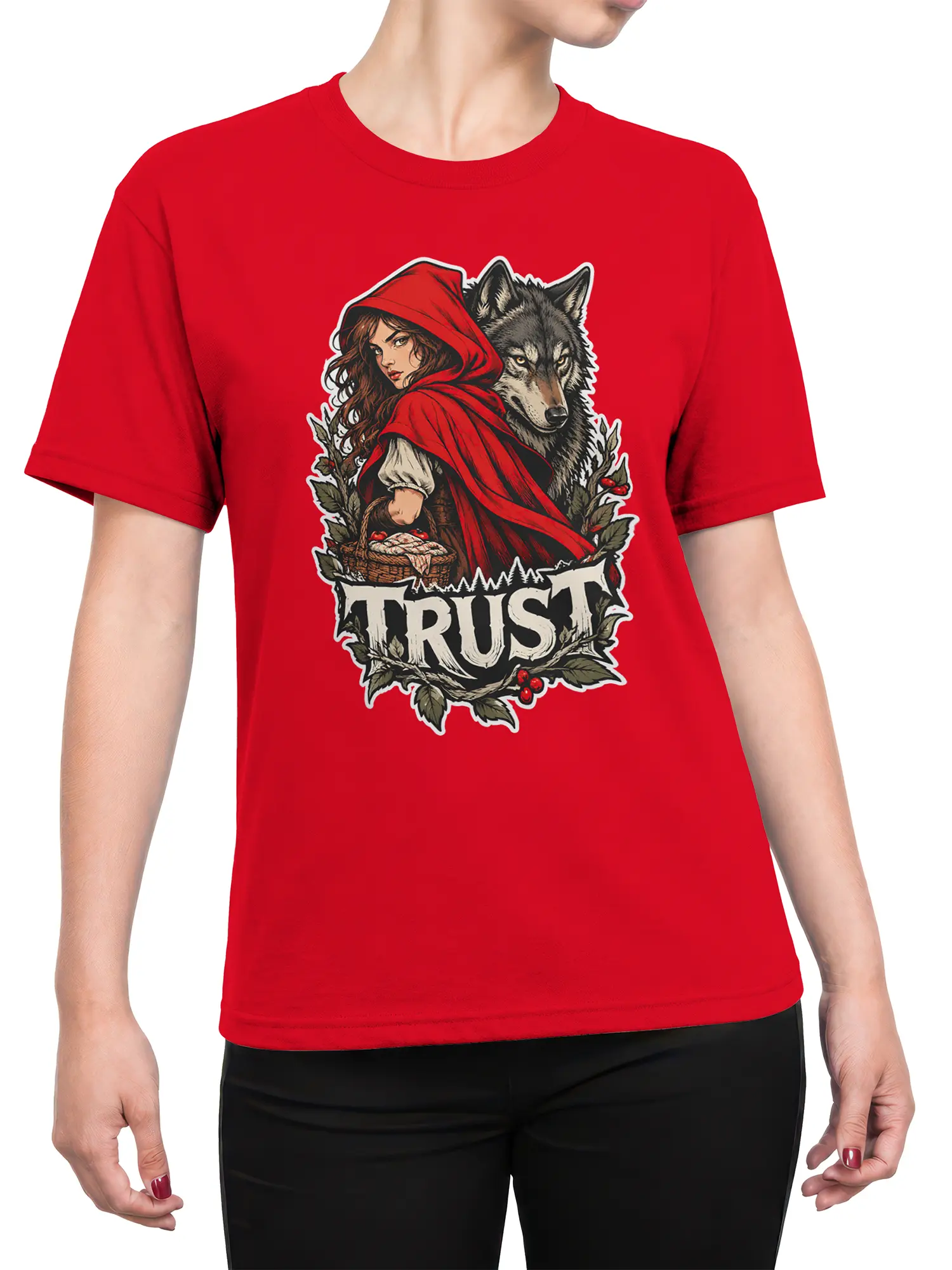 Female torso wearing a red T-shirt with a hooded woman, gray wolf, forest foliage, and TRUST graphic