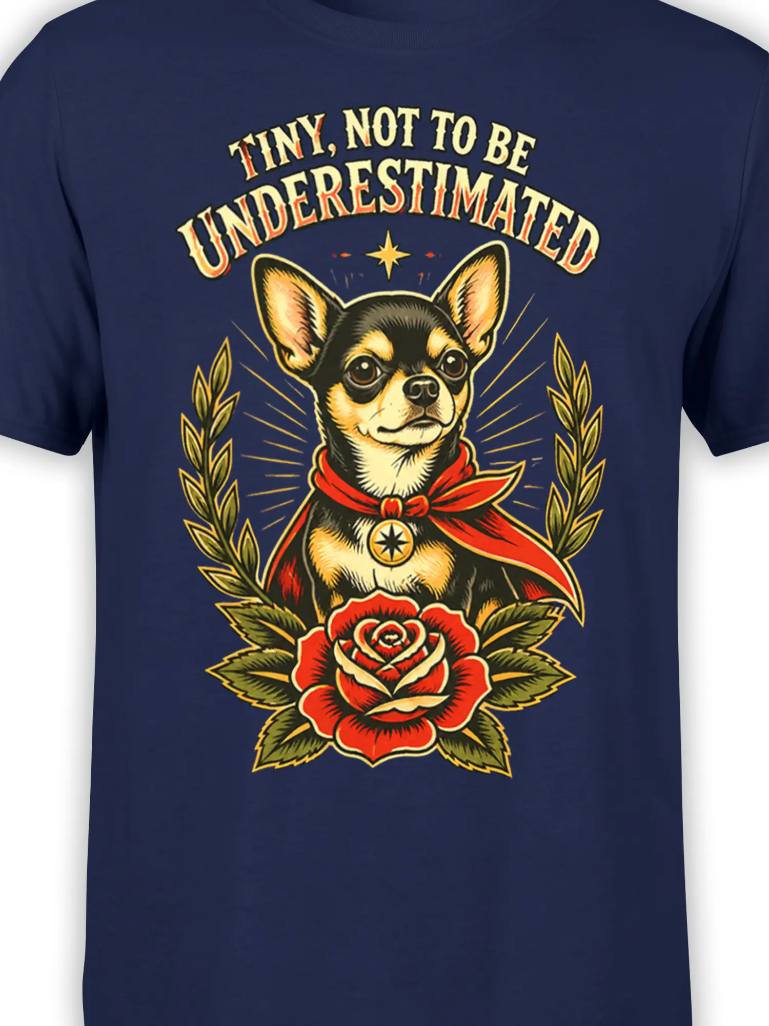 Close-up of caped Chihuahua-style dog, red rose, laurel leaves, and bold vintage lettering on navy fabric