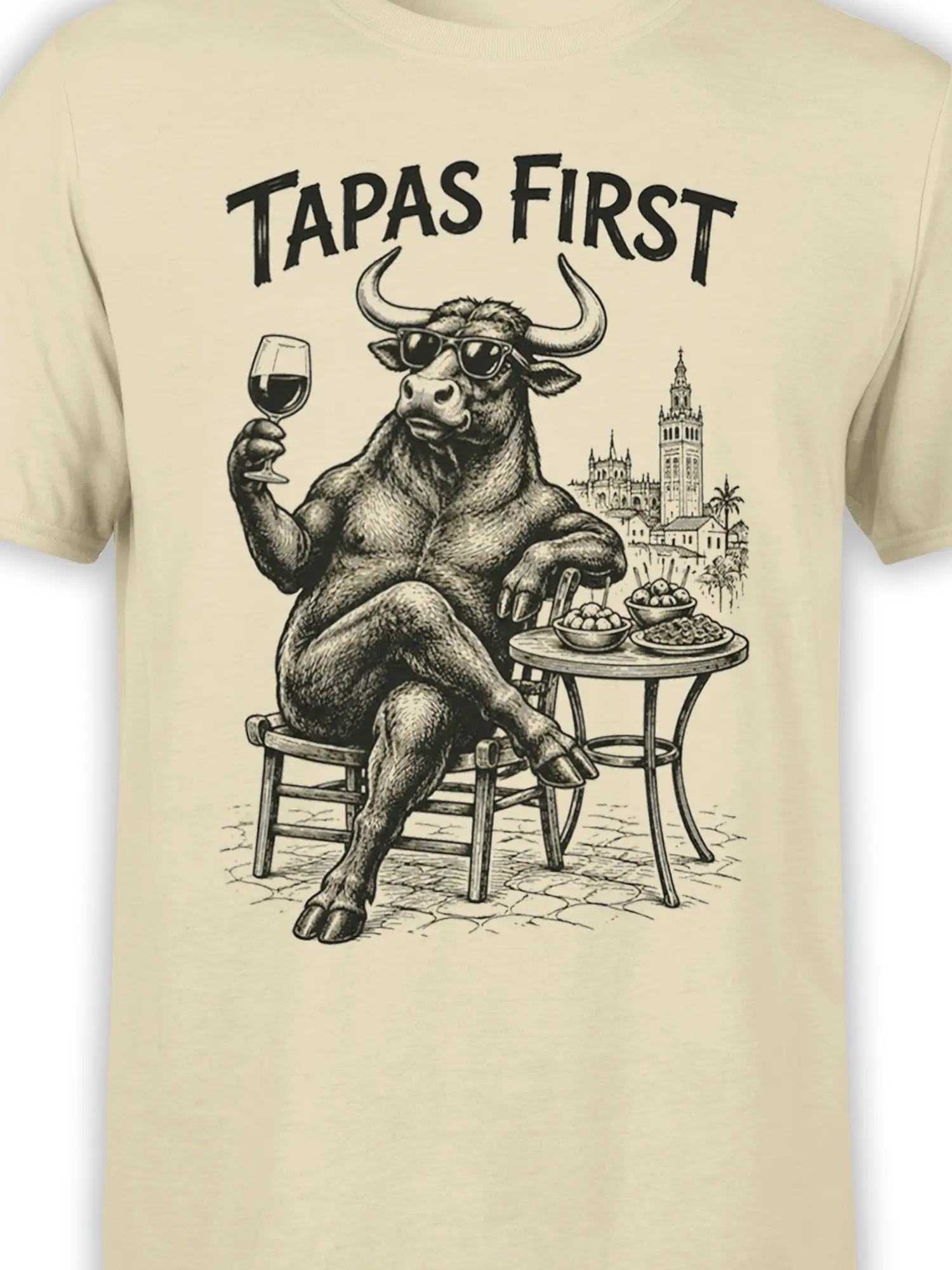Close-up of the vintage bull graphic with sunglasses, wine glass, tapas, and TAPAS FIRST lettering