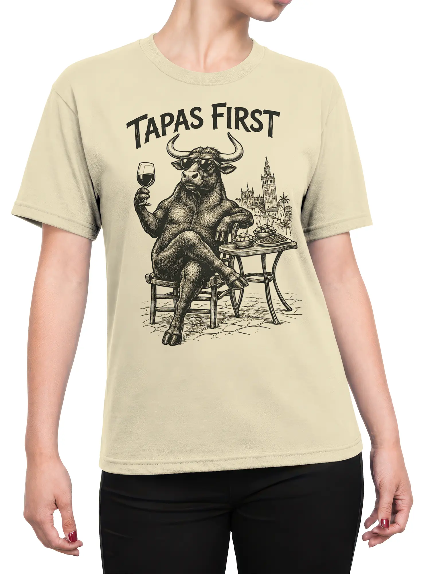 Female torso wearing a beige T-shirt with a vintage sunglasses bull, wine, tapas, and TAPAS FIRST design