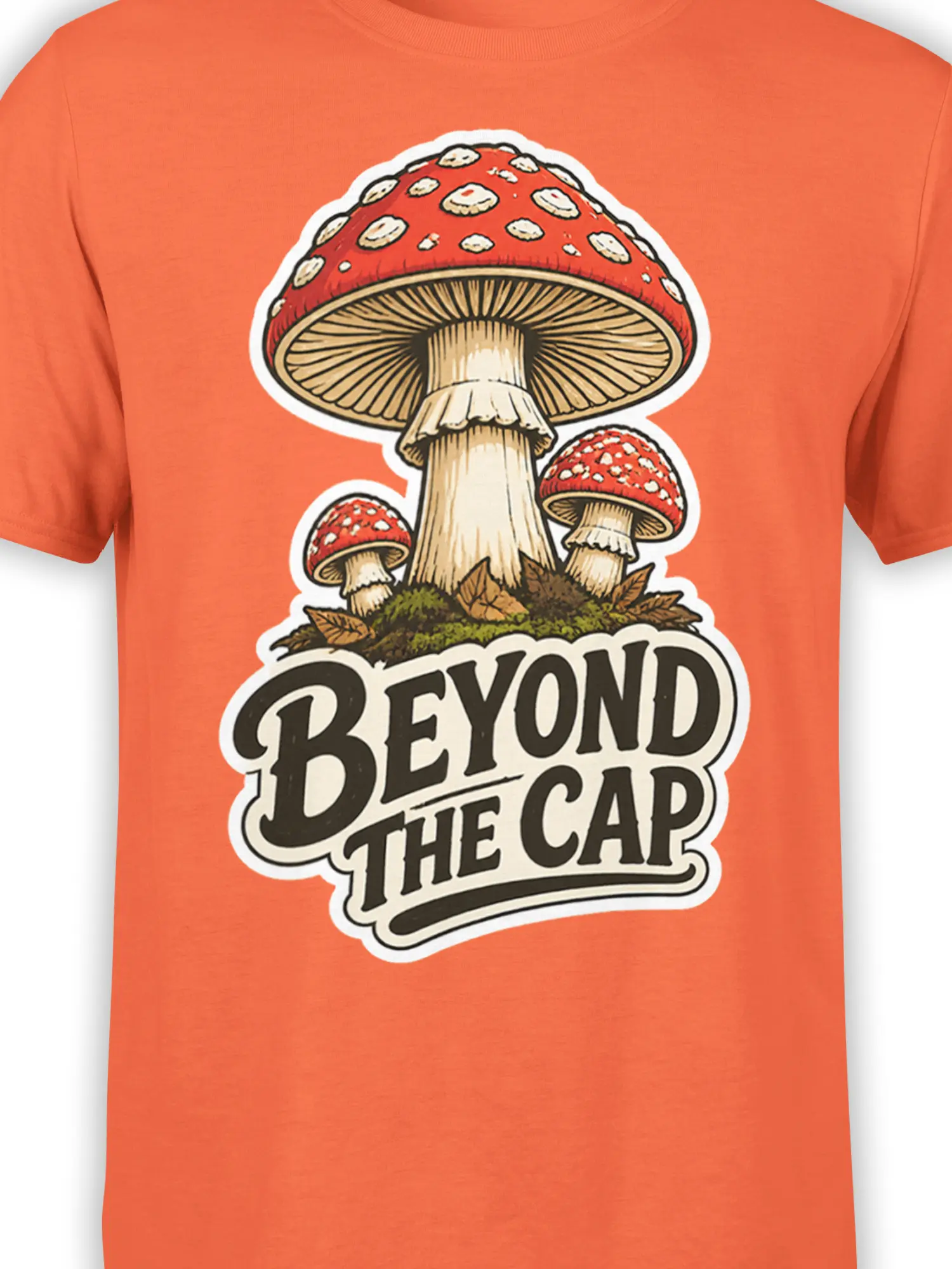 Close-up of red-capped mushrooms and “BEYOND THE CAP” artwork on an orange graphic T-shirt