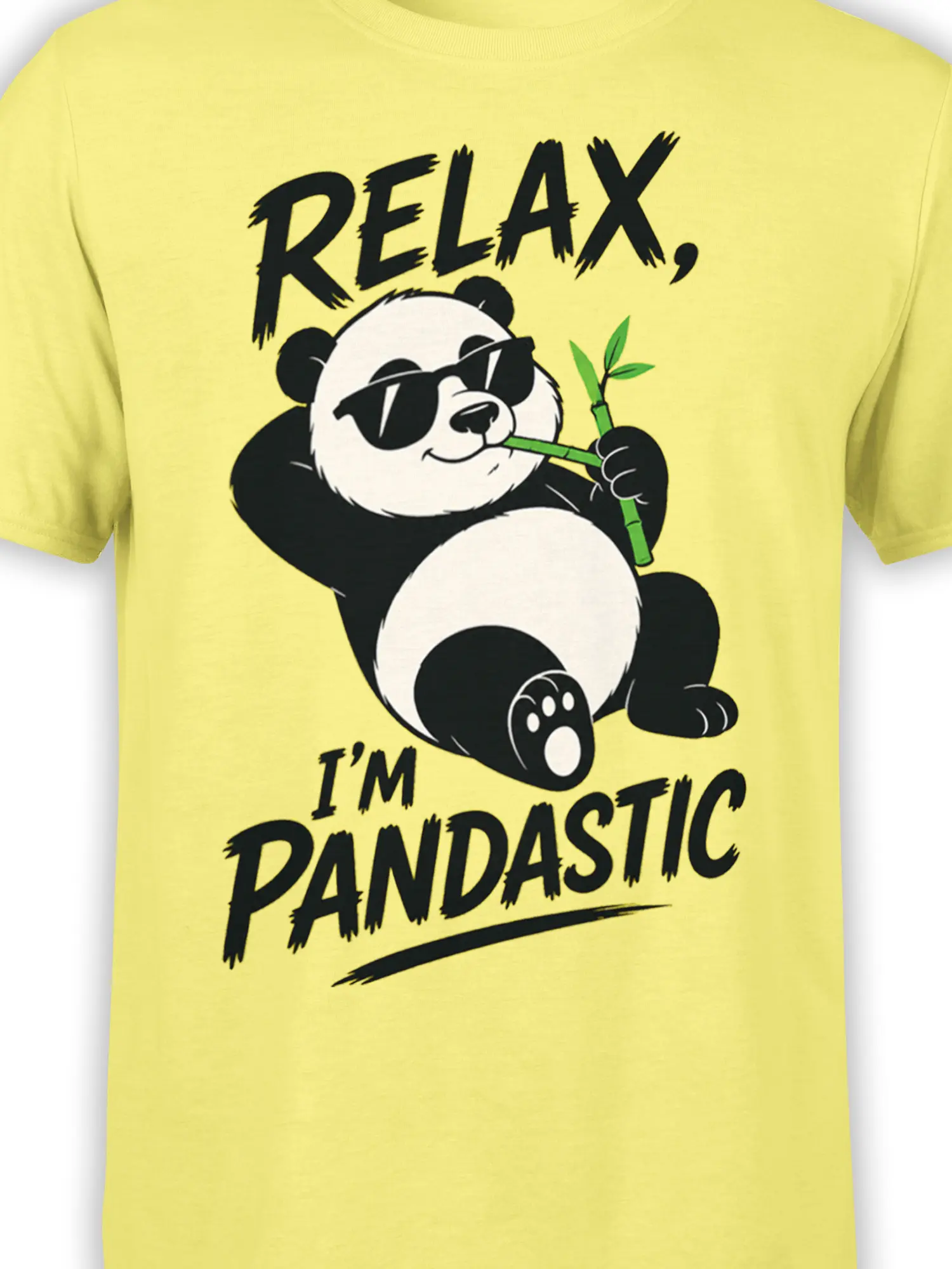 Close-up of the relaxed panda graphic, sunglasses, bamboo, and bold lettering on a yellow T-shirt