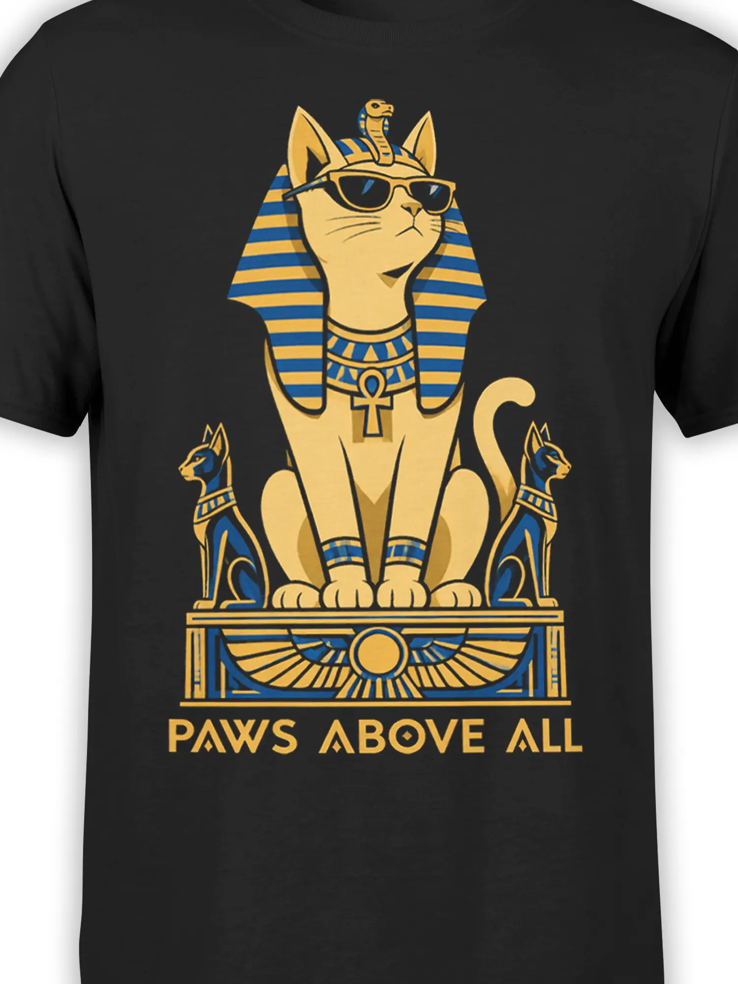 Close-up of Egyptian-inspired cat artwork in blue and gold on a black graphic T-shirt