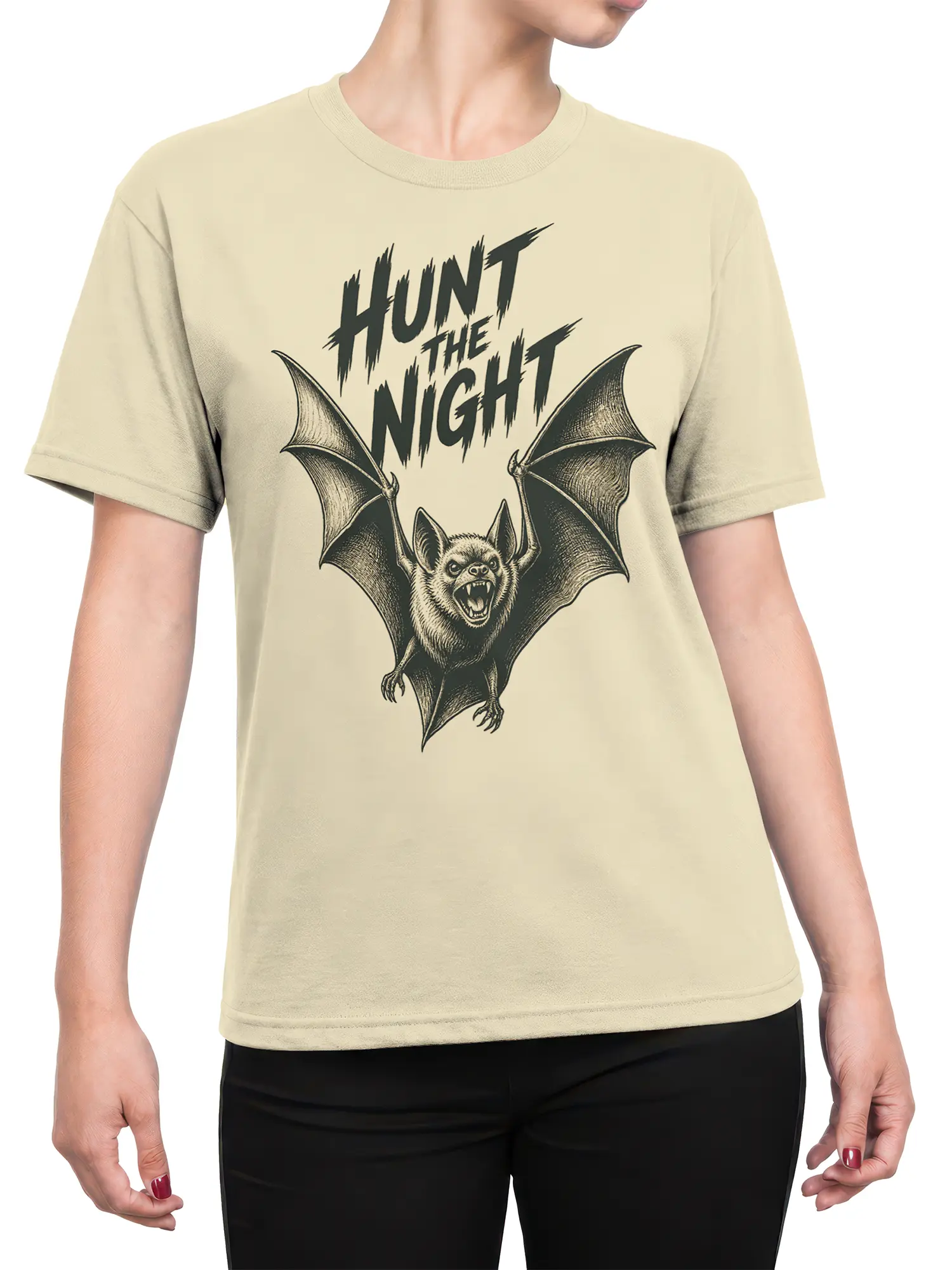 Female torso wearing a beige bat graphic tee with vintage wings and Hunt the Night lettering