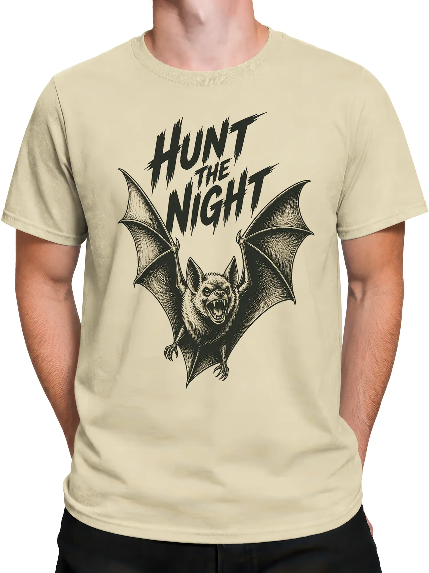 Male torso wearing a beige vintage bat tee with bold Hunt the Night graphic