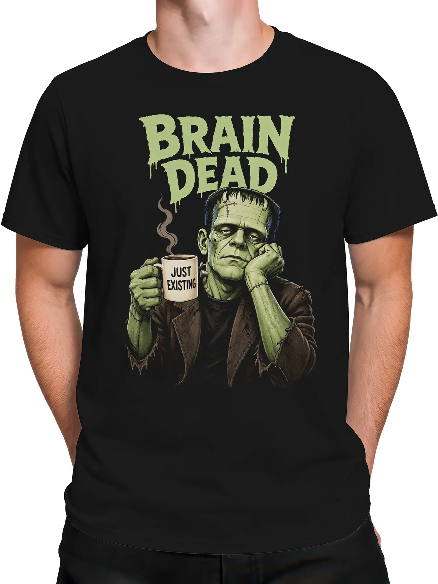 Male torso wearing black monster shirt with Brain Dead and Just Existing design