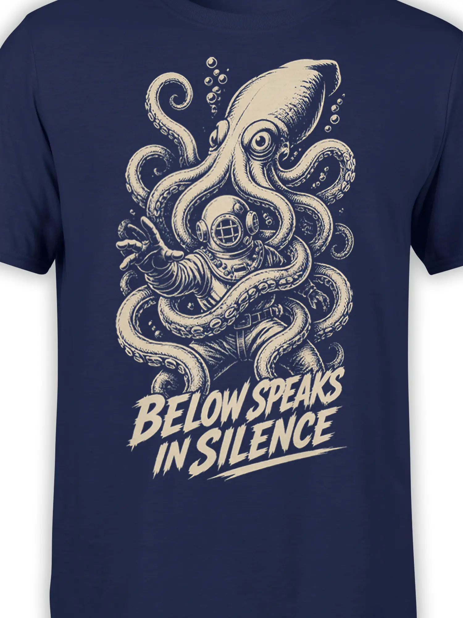Close-up of octopus diver artwork, tentacles, bubbles, and cream lettering on a navy graphic tee