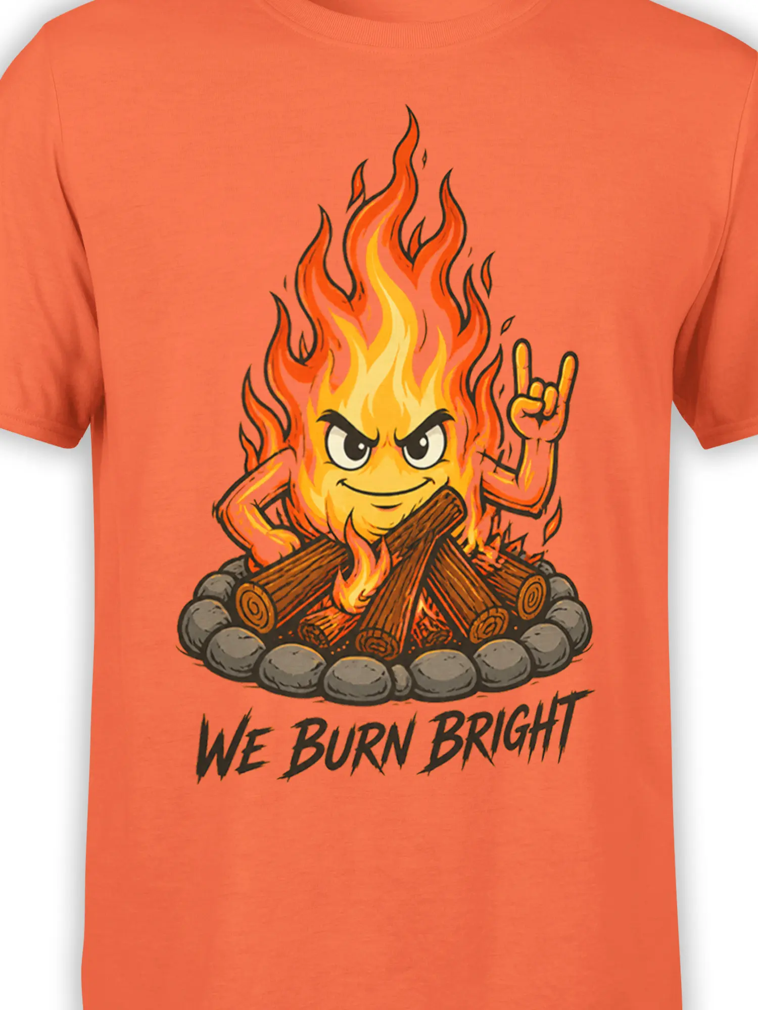 Close-up of the orange shirt graphic showing a grinning flame character, colorful fire, logs, and bold “WE BURN BRIGHT” lettering