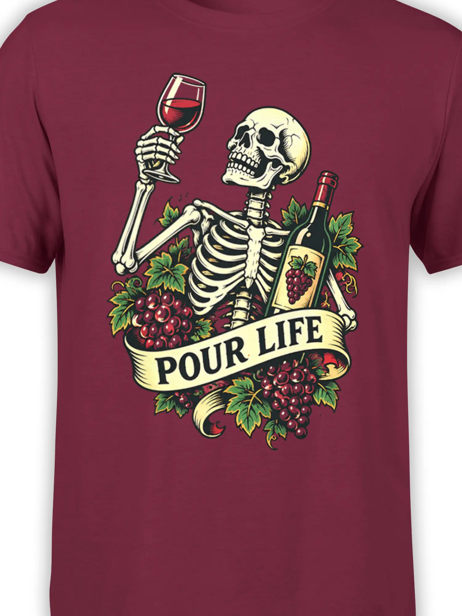 Close-up of the skeleton wine design, grapes, bottle, and “POUR LIFE” banner on a burgundy shirt